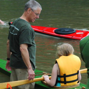 Dave Sides with a young paddler
